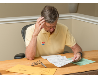 man reviewing proposal